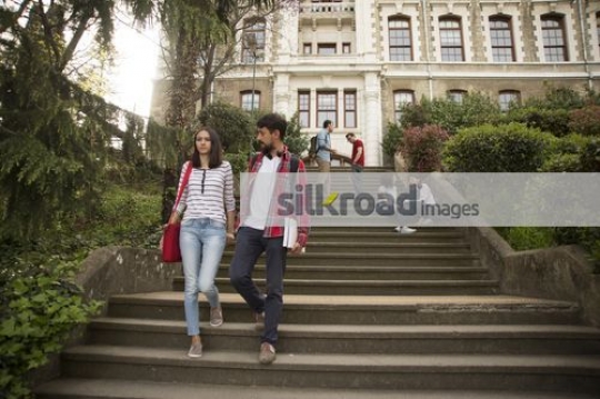 Students walking down the stairs|