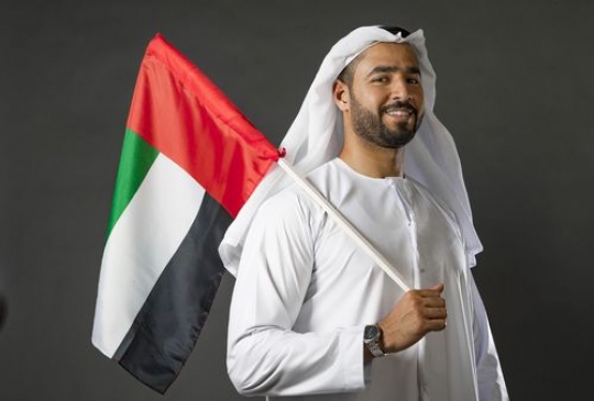 Arab man proudly celebrating his own country
