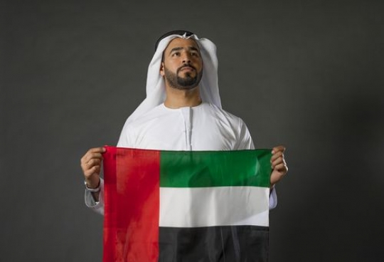 Middle Eastern man representing his country