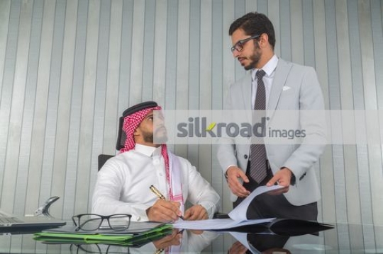 Businessmen working together at the office|