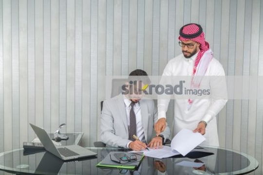 Businessmen at the office working|