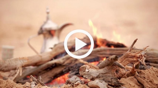Making Arabic coffee in the desert