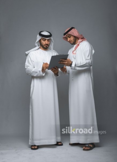 Manager signing papers