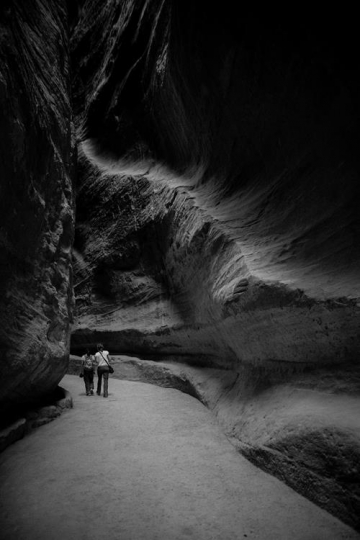 walk in rock passage in black and white
