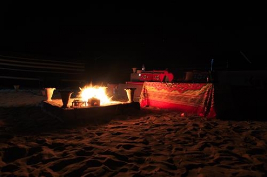 fire in a camp at night