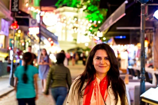 woman in a market place evening