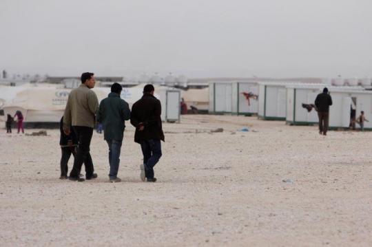 humanitarian workers in a refugee camp