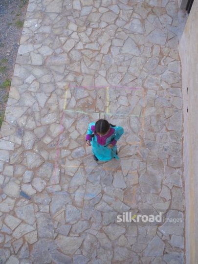 Girl playing outside|-