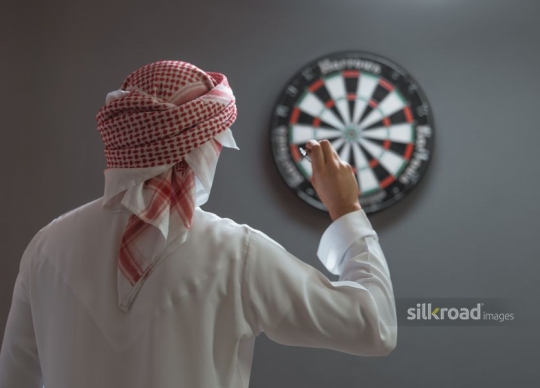 Man playing darts