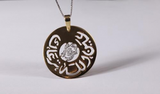 golden pendant and chain
