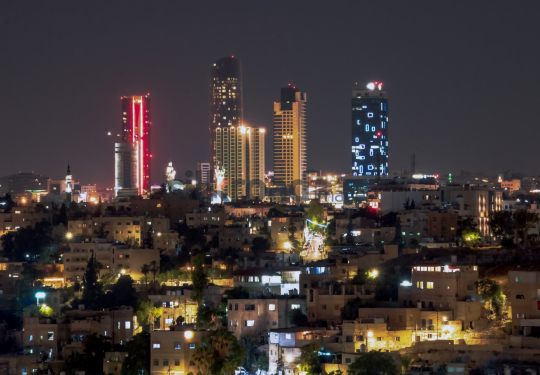 Amman Skyline at Night with Illuminated Skyscrapers