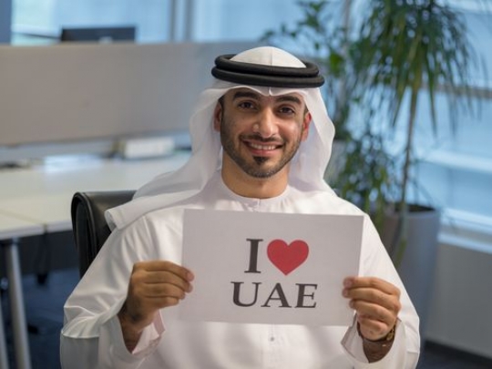 Arab businessman celebrating the UAE National Day|