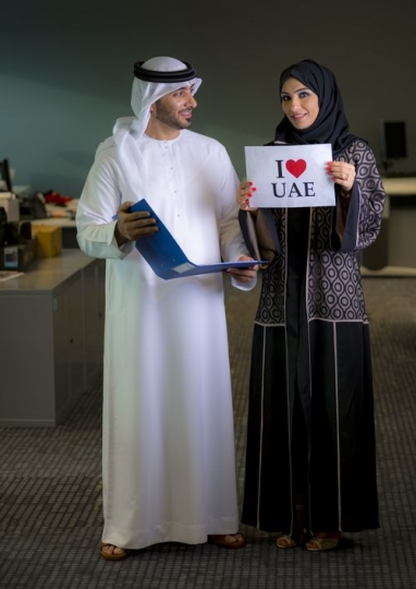 Two arab employees celebrating national day|-