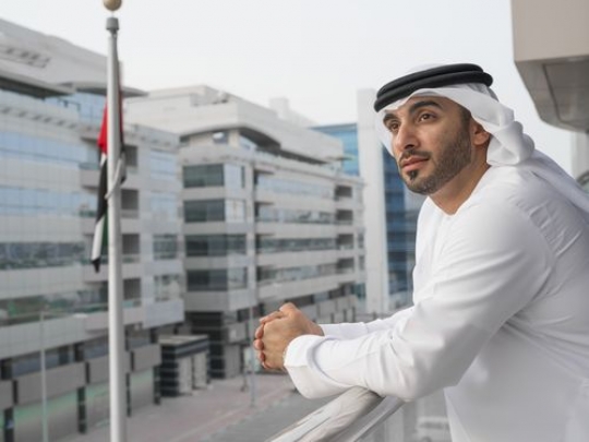 Businessman standing outside|-