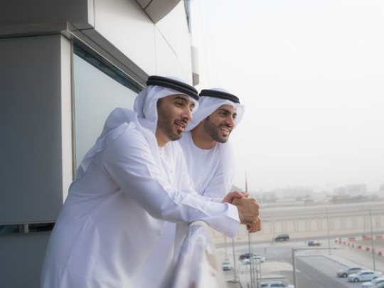 Employees spending time at the balcony|-