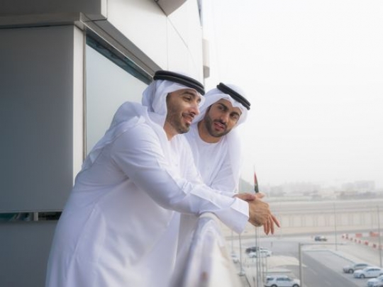 Employees socializing at the balcony|-