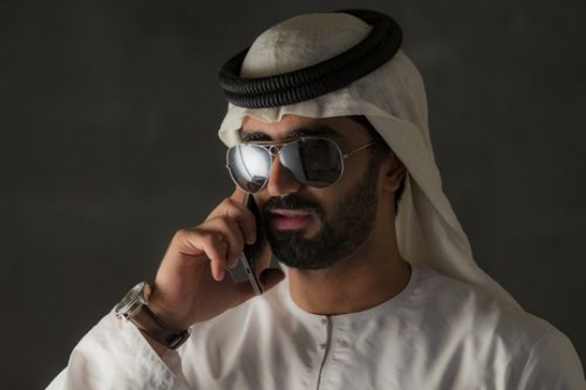 Arab Business man on the phone|-