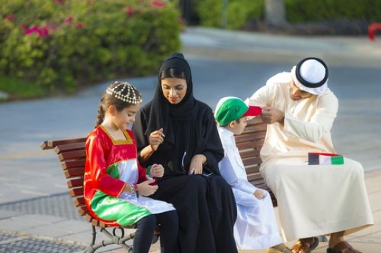 Portrait of a middle easter family getting ready for national day |-