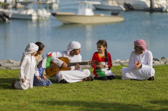 Arab teenagers and kids celebrating national day|-