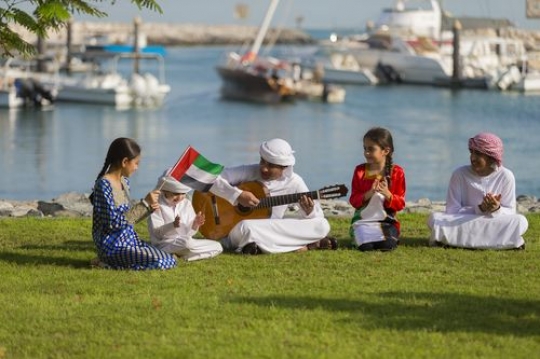 Arab kids and teenagers celebrating national day|-