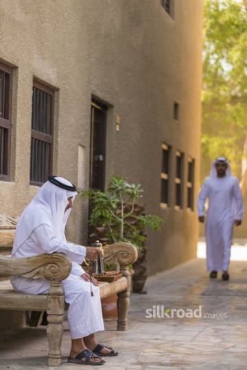 Arab man walking towards his father|-