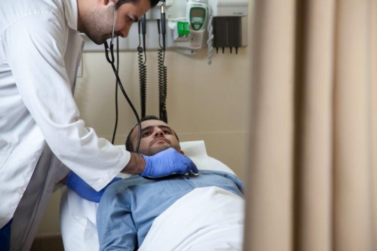 Doctor Examining Patient at ER