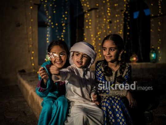 Kids playing with sparkling matches|-