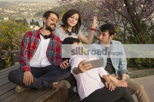Friends taking a selfie together|