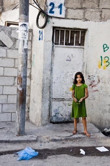 little girl standing without shoes