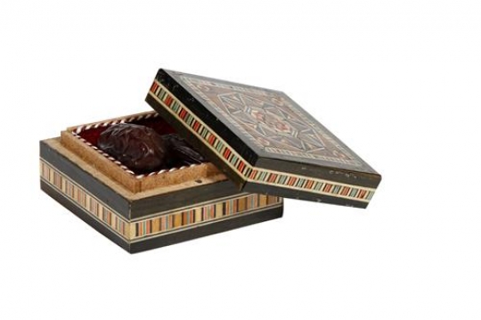 Dried Dates Inside A Wooden Bo