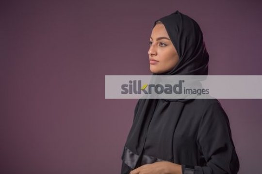 Middle Eastern woman standing|