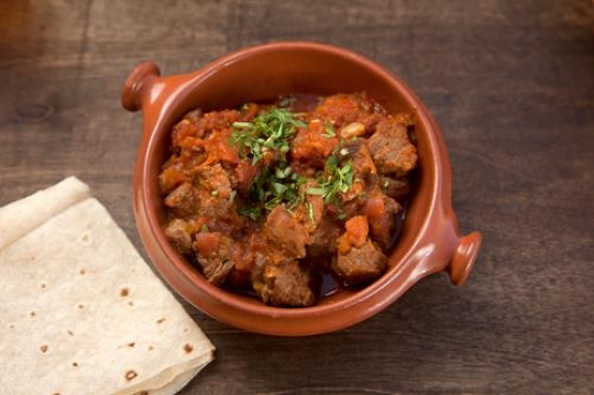 bowl of ful mudammas with a bread