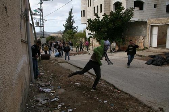 Palestinian youth fighting