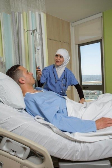 A Nurse Checking on Inpatient