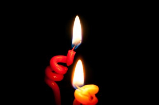 burning candles in the dark