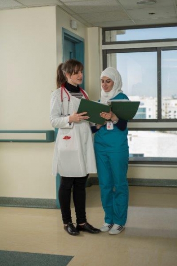 A Woman Doctor and Woman Nurse at Hospital
