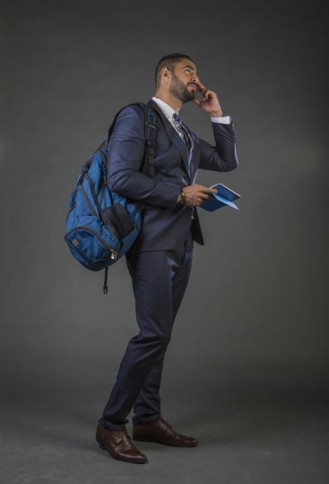 Middle Eastern man traveling for a Business trip|-