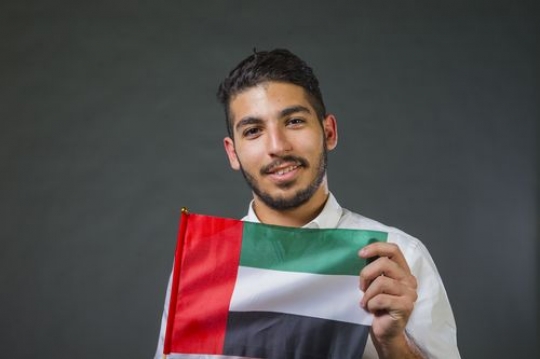 Middle Eastern expat celebrating the UAE National Day
